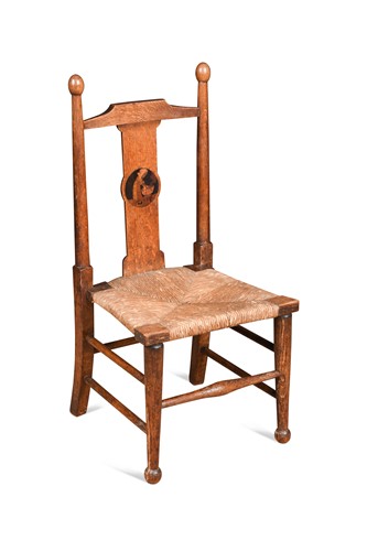 Lot 145 - An Arts and Crafts oak 'nursery-rhyme' chair by Liberty