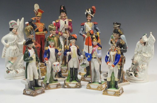 Lot 44 - A collection of bone china model soldiers,...