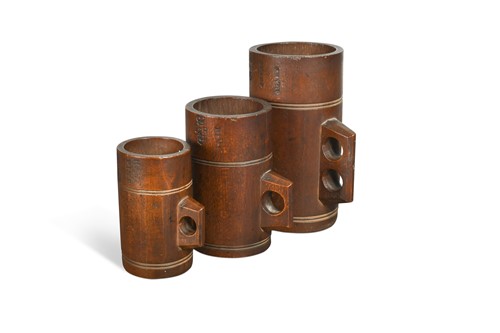 Lot 419 - Three beech mug shape official liquid measures, Victorian and later