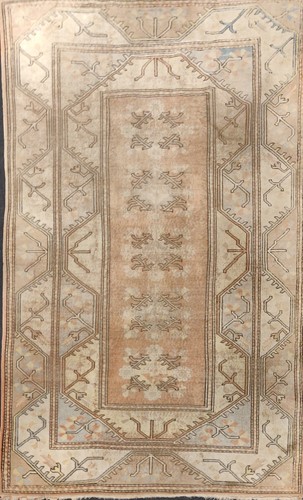 Lot 516 - a modern caucasian style turkish rug with pale...