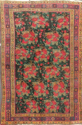 Lot 521 - A beluchi rug with floral field, 240 x 157cm