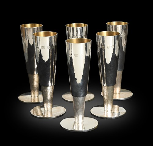 Lot 89 - A set of six Elizabeth II silver champagne flutes by Gerald Benney CBE (1930-2008)