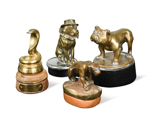 Lot 117 - A group of four brass car mascots