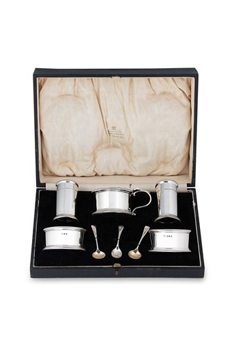 Lot 611 - A George V silver 5-piece cruet set in a fitted case