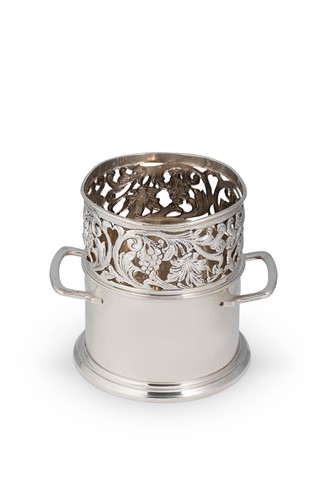 Lot 671 - Dublin - A 20th century silver two handled syphon stand