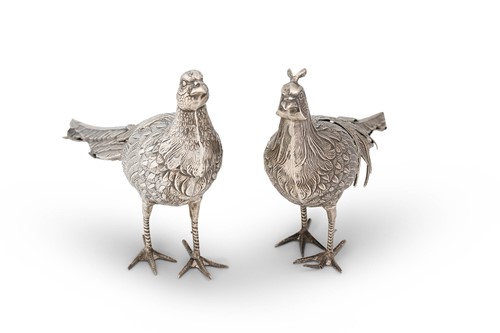 Lot 466 - Two mid 20th century Spanish metalwares silver table ornaments modelled as a brace of peacocks