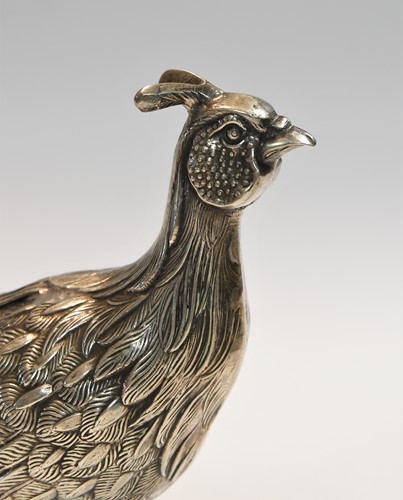 Lot 466 - Two mid 20th century Spanish metalwares silver table ornaments modelled as a brace of peacocks