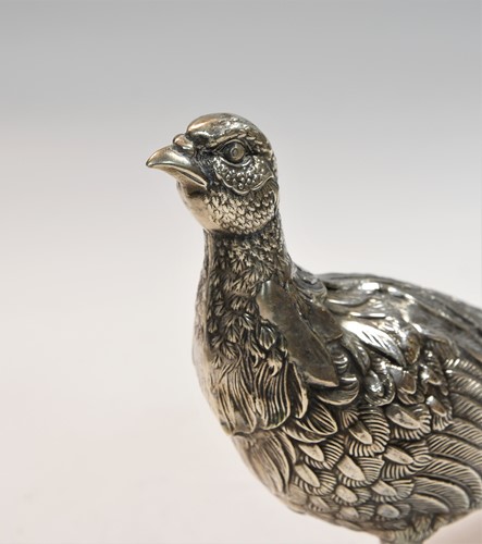 Lot 466 - Two mid 20th century Spanish metalwares silver table ornaments modelled as a brace of peacocks