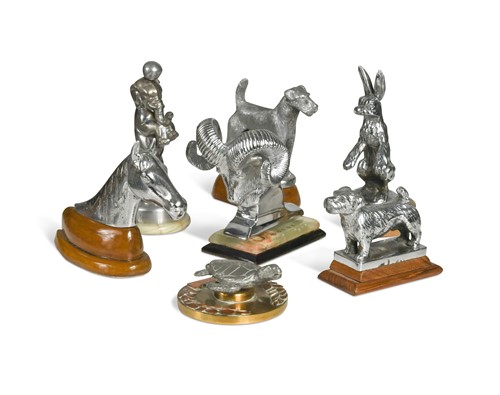 Lot 124 - A group of seven car mascots, each modelled as various animals