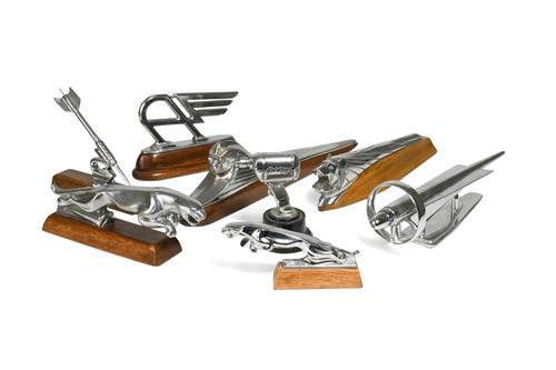 Lot 120 - A group of eight chromed car mascots