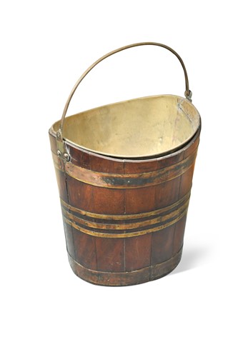 Lot 473 - A Georgian mahogany and brass bound peat bucket