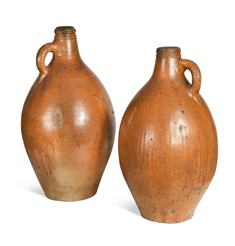 Lot 323 - Two salt glazed flagons, 18th century