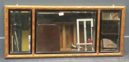 Lot 469 - A gilt triple overmantle mirror