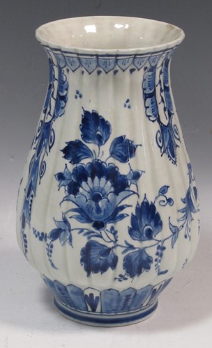 Lot 4 - A blue and white Delft tulip vase with flared...