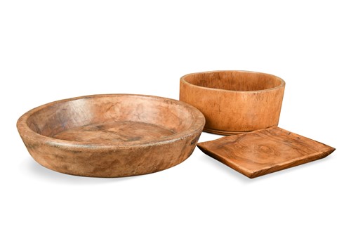 Lot 412 - Two elm bowls and a small elm tray, 19th century