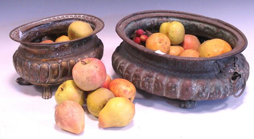 Lot 164 - An 18th century copper bowl with gadrooned...