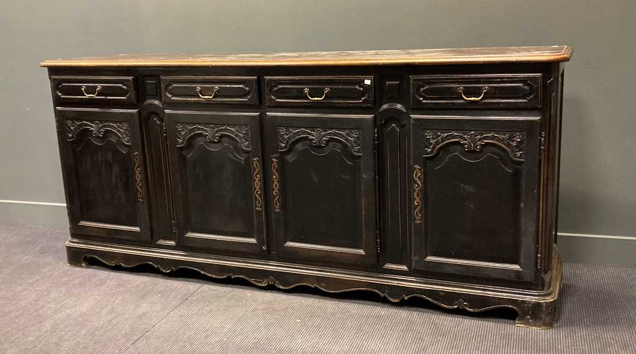 Lot 436 - A French black-painted carved wood dresser...