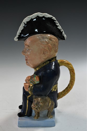 Lot 31 - A Clarice Cliff Winston Churchill toby jug, circa 1940
