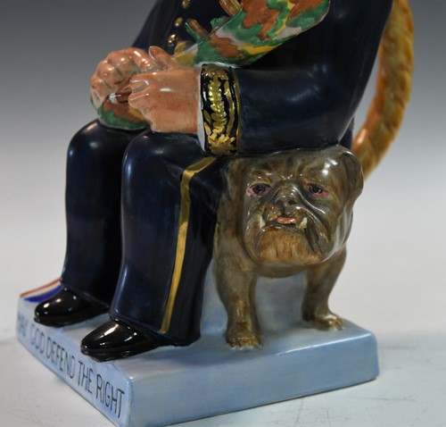 Lot 31 - A Clarice Cliff Winston Churchill toby jug, circa 1940
