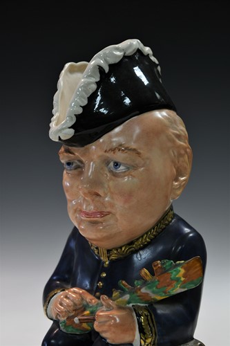 Lot 31 - A Clarice Cliff Winston Churchill toby jug, circa 1940