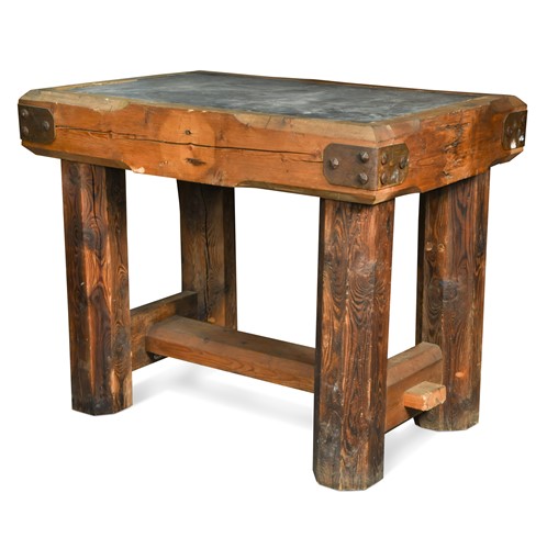 Lot 526 - A butcher's block with inset slate top, 20th century