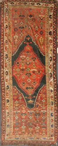 Lot 512 - A Qashqai tribal runner circa 1920, 305 x 106cm
