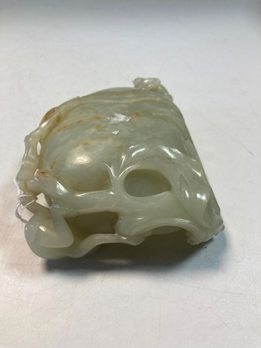 Lot 70 - A Chinese mutton fat jade ape and fruit bowl,  Qing Dynasty, 19th century