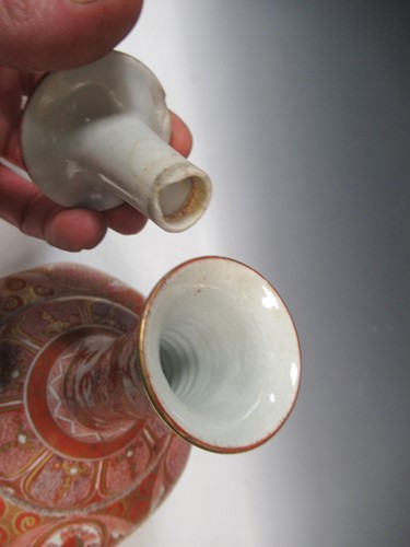 Lot 12 - A pair of Japanese Kutani-style vases with...