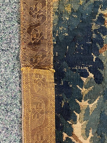 Lot 365 - Two verdure tapestry panels, 18th century