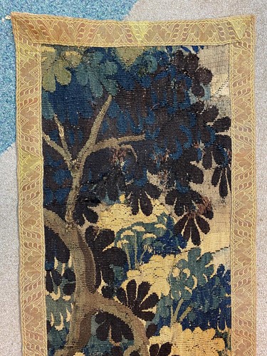 Lot 365 - Two verdure tapestry panels, 18th century