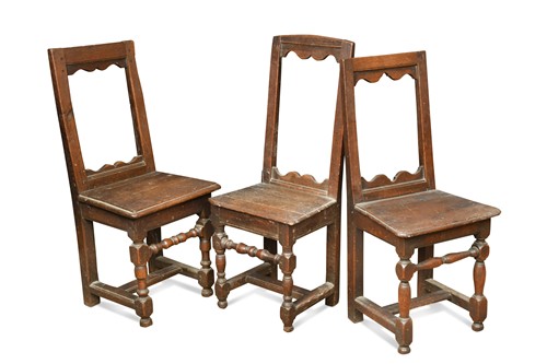 Lot 354 - Three similar oak back stools, late 17th century