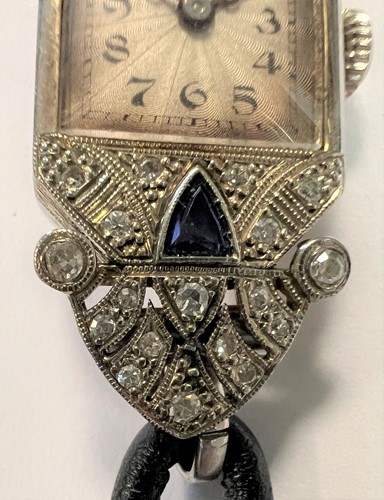 Lot 341 - Rolex - An 18ct gold diamond and sapphire set cocktail watch