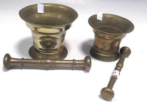 Lot 75 - Two brass pestle and mortars (2)