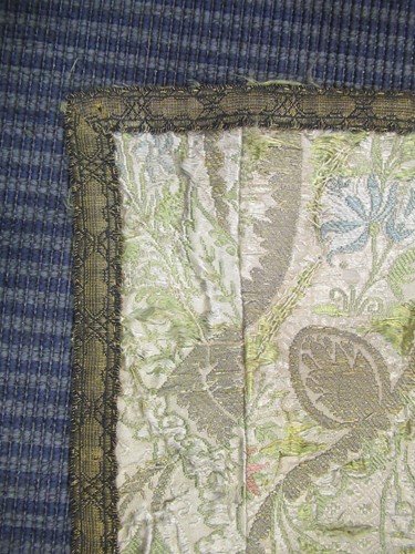 Lot 181 - Three antique silk embroidered panels, one...