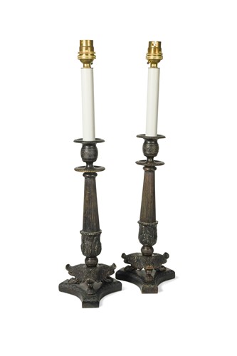 Lot 593 - A pair of Regency style bronze candlestick lamps, 20th century