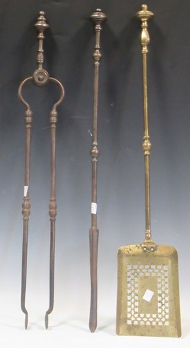 Lot 470 - Two fire irons from a set comprising tongs and...