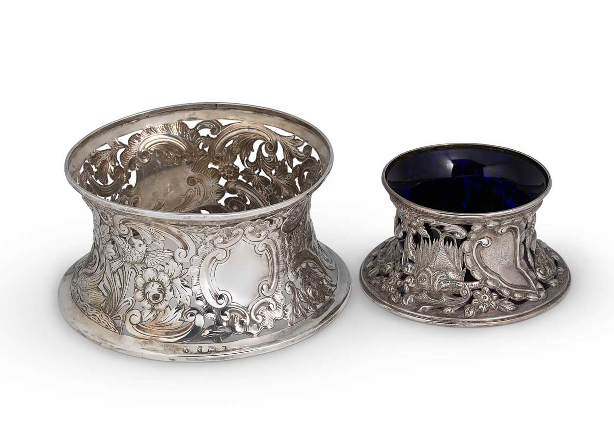 Lot 589 - An Edward VII silver dish ring together with a smaller Victorian English provincial example