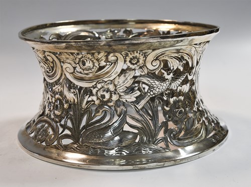 Lot 589 - An Edward VII silver dish ring together with a smaller Victorian English provincial example