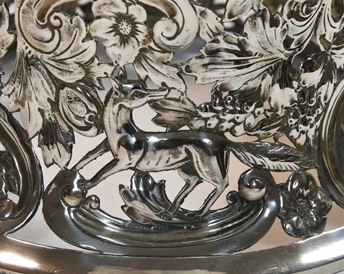 Lot 589 - An Edward VII silver dish ring together with a smaller Victorian English provincial example