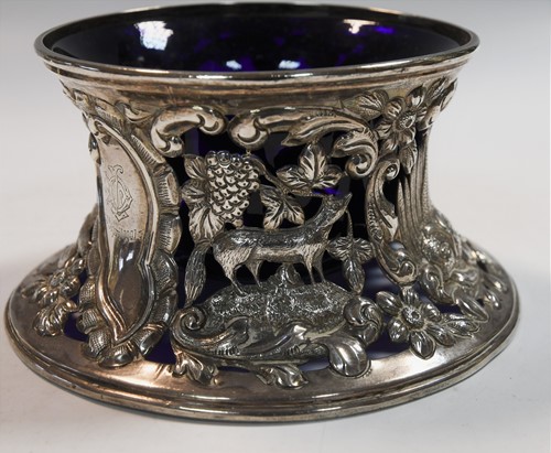 Lot 589 - An Edward VII silver dish ring together with a smaller Victorian English provincial example