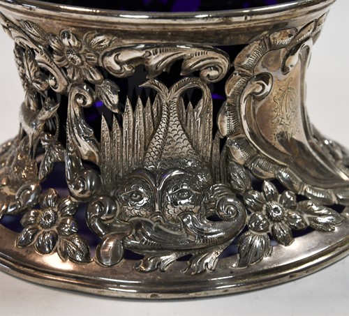 Lot 589 - An Edward VII silver dish ring together with a smaller Victorian English provincial example