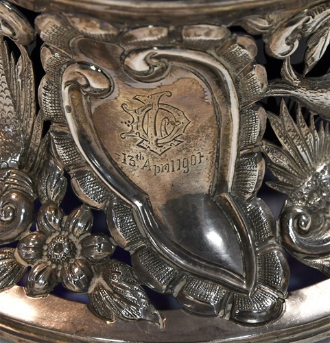Lot 589 - An Edward VII silver dish ring together with a smaller Victorian English provincial example