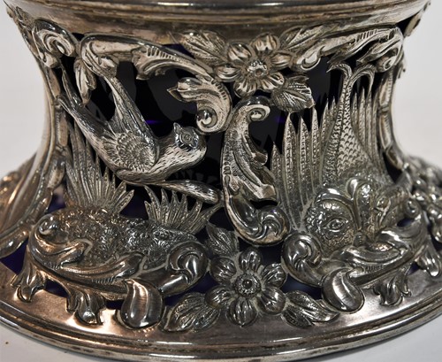 Lot 589 - An Edward VII silver dish ring together with a smaller Victorian English provincial example
