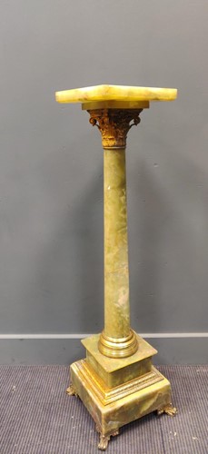 Lot 478 - A gilt onyx pedestal column