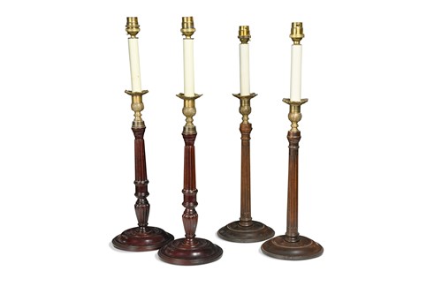 Lot 454 - A pair of brass and mahogany candlestick lamps, 20th century