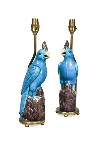 Lot 737 - A pair of china lamps modelled as parrots, 20th century