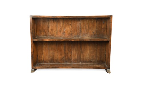 Lot 645 - A concave pine open bookshelf, 18th century