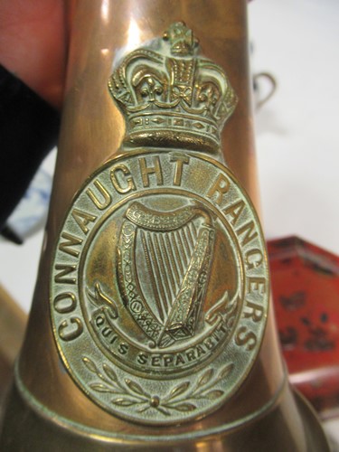 Lot 34 - A Connaught Rangers crested copper bugle,...