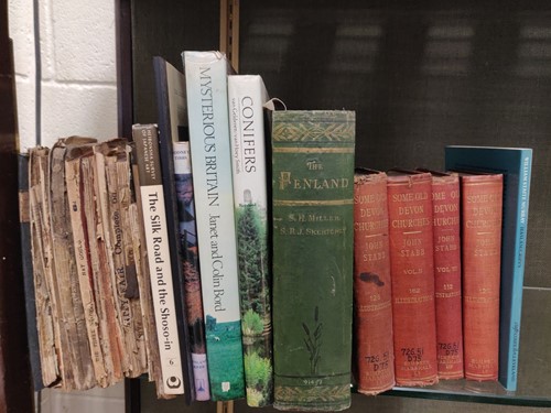Lot 527 - A collection of reference books and novels on...