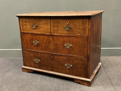 Lot 474 - An 18th century walnut chest of drawers fitted...